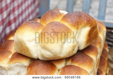 Whole filled yeast dumplings in a basket.