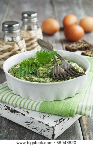 Omelet With Nettles In The Ceramic Pot