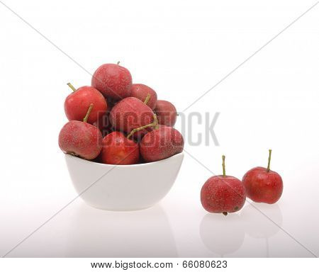 Hawthorn on white background bowl.