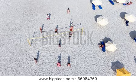 People Playing Beach Volley At The Beach Of Kallithea, One Of The Most Visited Destinations In Greec