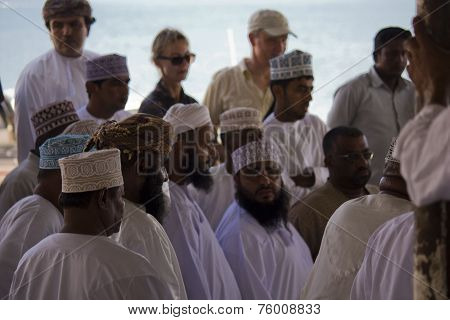 Men at the Daily Fish Market In Barka