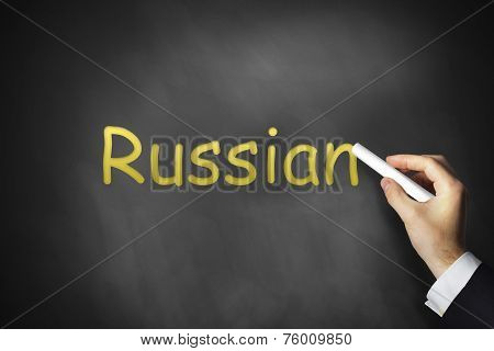 Hand Writing Russian On Black Chalkboard