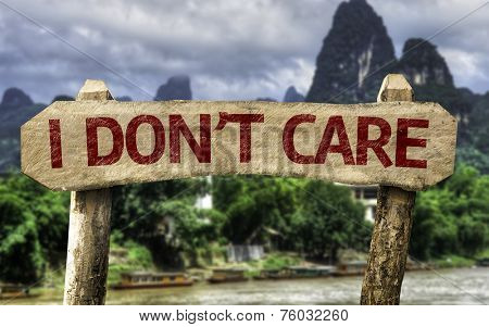 I Don't Care sign with a forest background