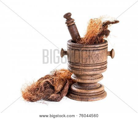Dry corn silk (Stigmata Maydis) with  mortar on a white background 