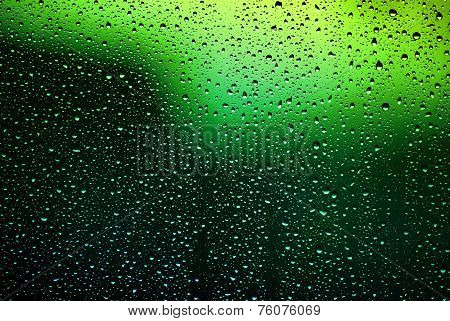 Bright Water Droplets On Glass