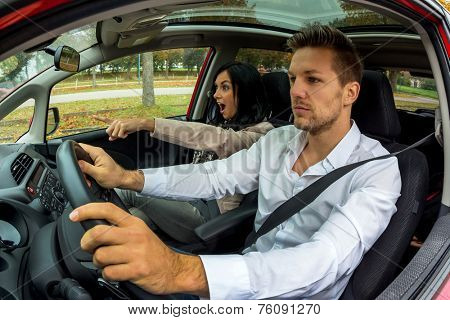 a couple traveling in a car