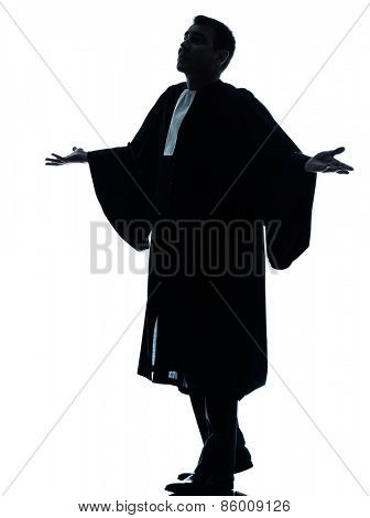 one  lawyer man pleading silhouette in studio isolated on white background