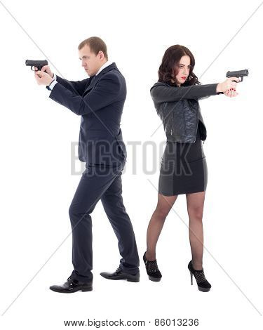 Full Length Portrait Of Woman And Man Shooting With Guns Isolated On White