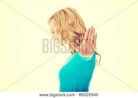 Woman expressing NO gesture with hand