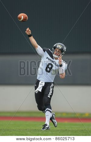 GRAZ, AUSTRIA - APRIL 04, 2014: QB Kyle Newhall (#8 Panthers) passes the ball in an AFL football game.