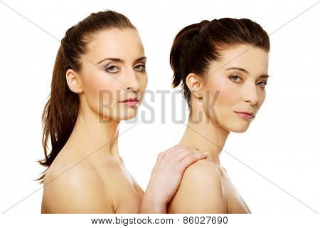 Beauty woman with make up standing behind her friend.