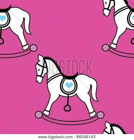 Rocking horse icons seamless wallpaper on pink background