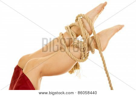 Woman Legs With Red Sheet Tied With Rope Feet Up