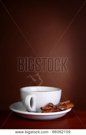 Cup Og Hot Coffee On Brown Background