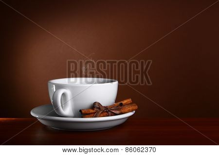Cup Og Hot Coffee On Brown Background