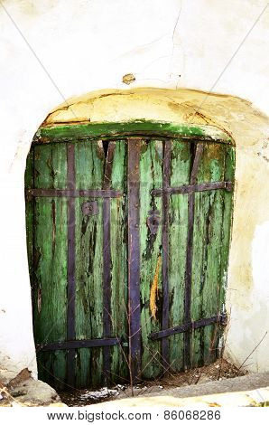 Green door to old wine cellar