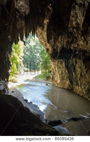 Entrance To The Tham Lod Cave With Stalactite And Stalagmite