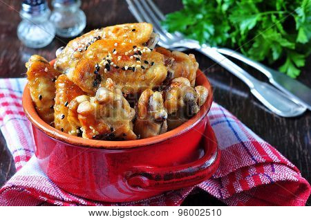 baked chicken wings in soy sauce with sesame seeds