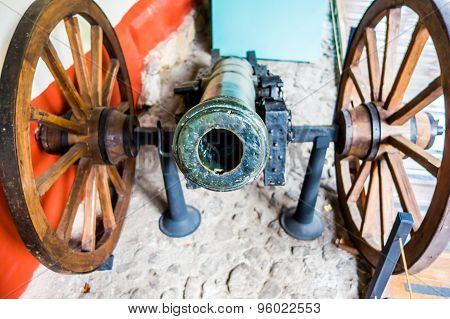 Frontal view of an old canon with wheels from Museum Quinta Simon Bolivar Bogota Colombia