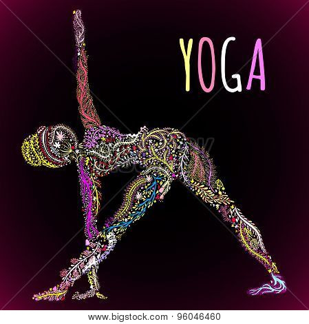 female silhouette practicing yoga pose.design with ornate flower