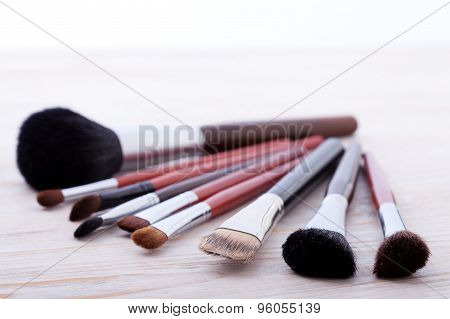 Professional Makeup Brush On White Wooden Background
