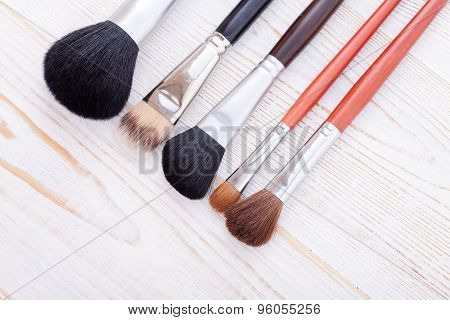 Professional Makeup Brush On White Wooden Background