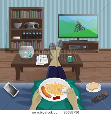 Man take supper at home and watching TV