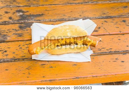 Sausage With Mustard On Buns.