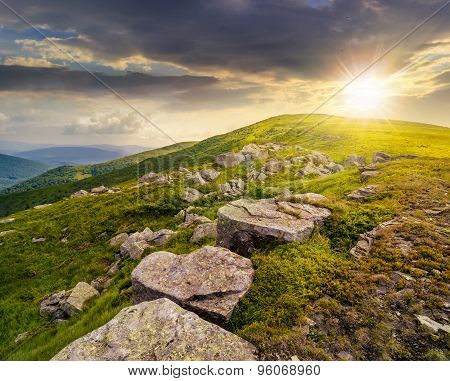 White Boulders On The Hillside At Sunset