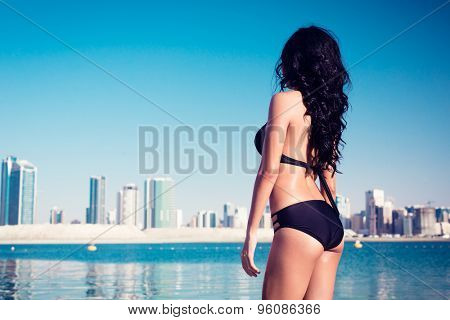 Sexy tourist girl in Dubai city beach