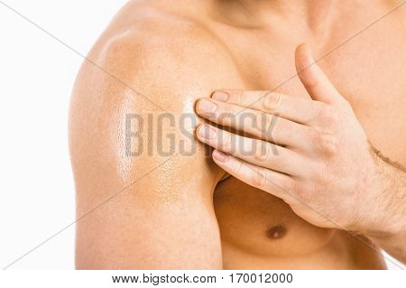 Testosterone Replacement Therapy (trt) - Muscular Man Applying Testosterone Gel On Shoulder