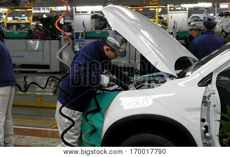 Tianjin, China. December 17Th 2016: Workers Assemble A Car On Assembly Line In Car Factory