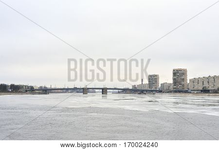 Volodarsky Bridge in St.Petersburg at cloud winter day Russia.