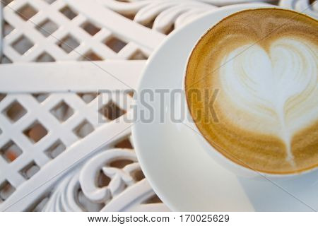 coffee cup and latte art in holiday