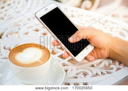 coffee cup and latte art in holiday