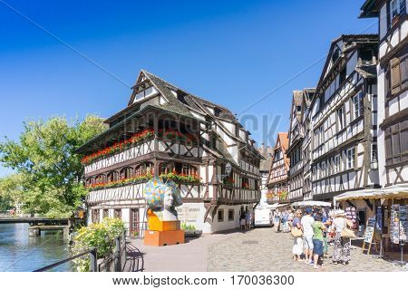 STRASBOURG, FRANCE - August 23, 2016 : Street view of Traditional houses in Strasbourg,  Alsace. is the official seat of the European Parliament, Located close to the border with Germany