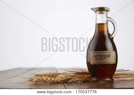 malt vinegar on the wooden table top