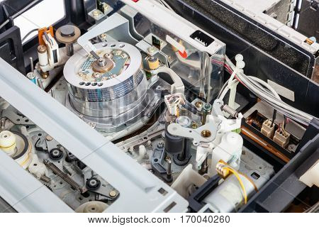 Interior of the mechanics of an old and obsolete VCR or Video Cassette Recorder