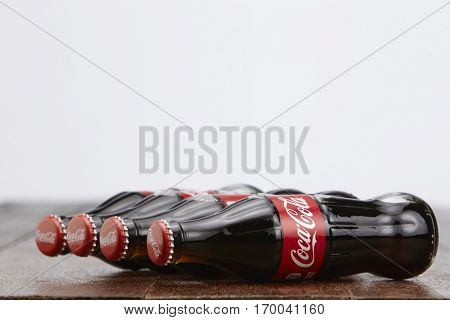 Kuala Lumpur, Malaysia 12th December 2016,coca cola soft drink on wooden table top