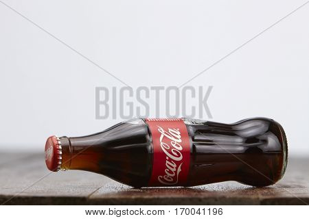 Kuala Lumpur, Malaysia 12th December 2016,coca cola soft drink on wooden table top
