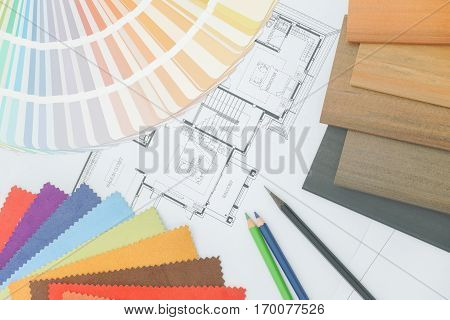 Sample Of Matterial, Color Pallette And Color Pencil On A Paper Of Architectural Drawing