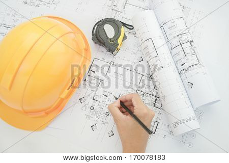 Architect Working On Construction Blueprint. Architects Workplace - Architectural Project, Blueprint