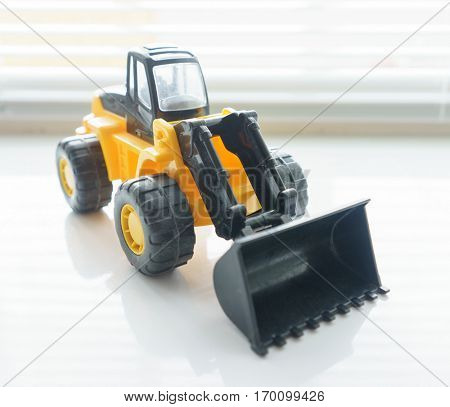 Toy Industrial Vehicle, Plastic Wheel Loader Excavator for Earth Moving Works at Construction Site, Miniature Earth Mover, Backhoe Loader, Frontend Loader with a Big Scoop, Heavy-duty Bulldozer