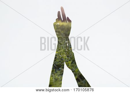 Double exposition of female hands isolated on a white background. Global warming concept.