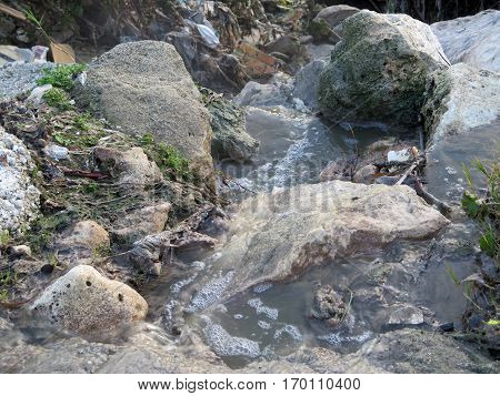 Polluted Water In Rubish Filled Gorge