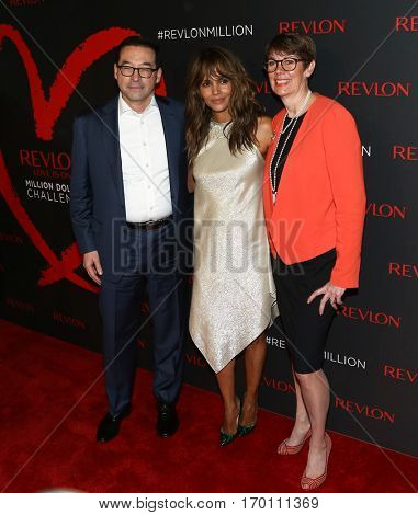 NEW YORK-DEC 01:(L-R) Revlon CEO Fabian Garcia, Halle Berry & Dr. Jill O'Donnell-Tormey attend Revlon's Love Is On Million Dollar Challenge Party at The Glasshouses December 1, 2016 in New York City. 