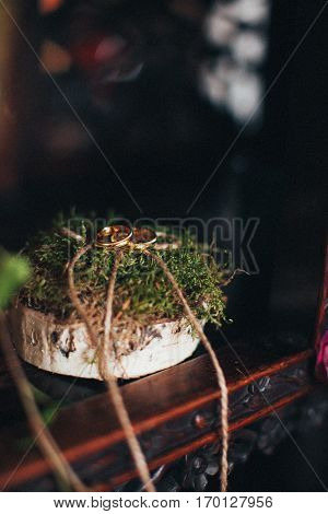 Golder Wedding rings decorated in boho style