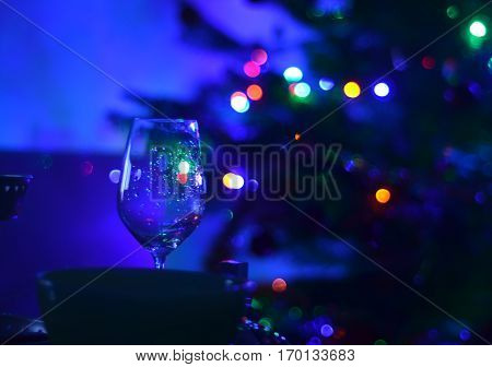 One Empty Wine Glass And Abstact Night Blury Defocus Bokeh Light Background Photography
