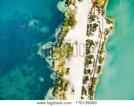Aerial view - sandy shore and green and blue water