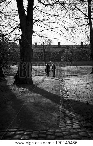Two friends walking and chattingSuomenlinna Island Fortress Helsinki Finland